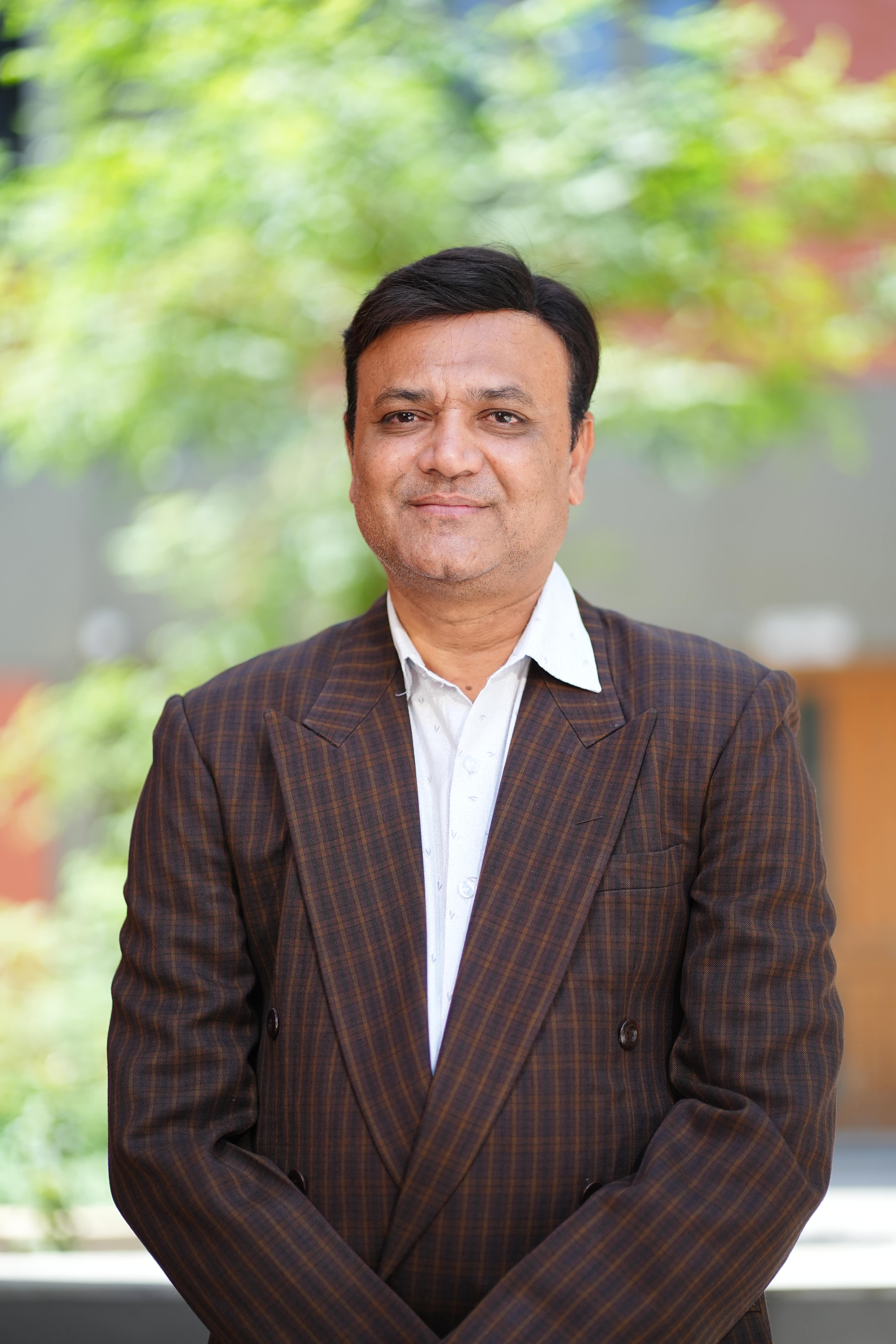 Dr. Dharmeshkumar Bhavsar